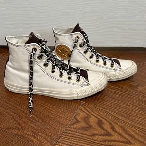 Women’s size 8 Converse, ivory and brown shoe with cheetah print laces